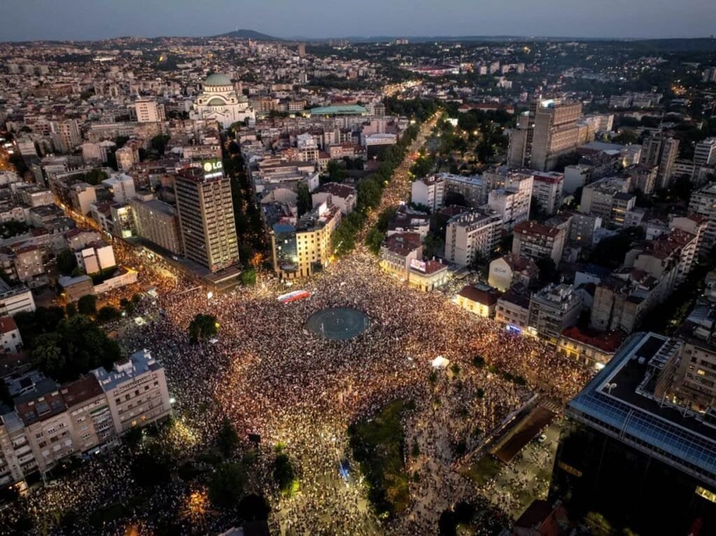 A crowd gathers in front of the parliament building in tbilisi, georgia,.